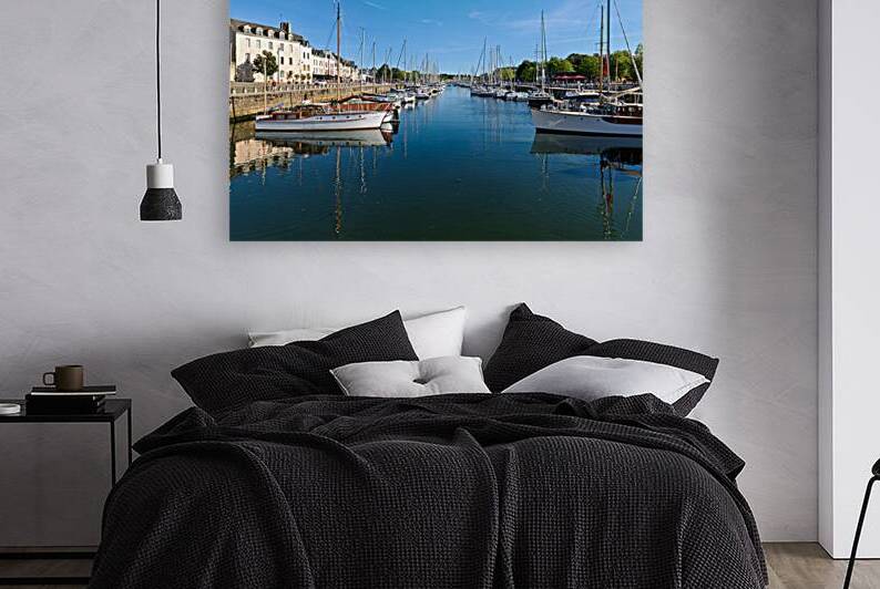 Boats moored in Vannes port on a clear day in Brittany France by Marco Brivio