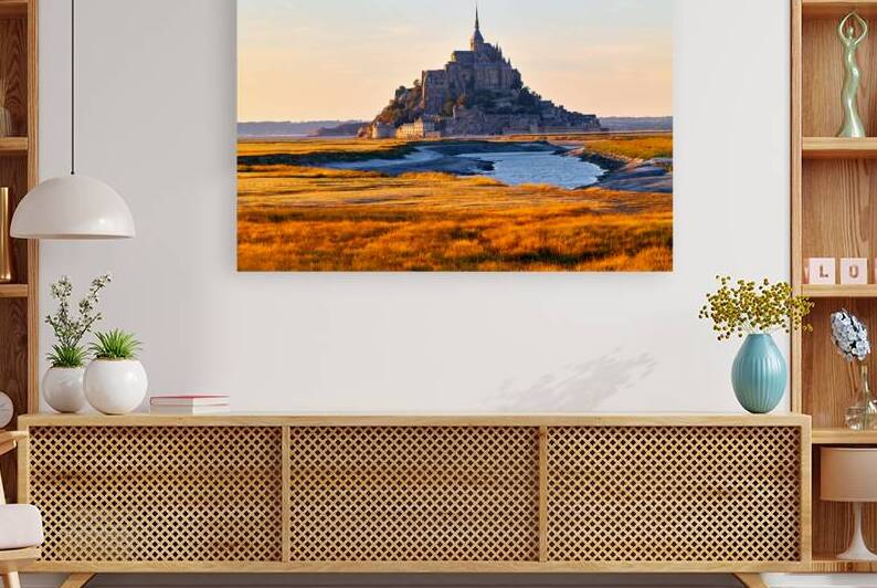Mont Saint Michel in Normandy France at dusk with fields and wat by Marco Brivio