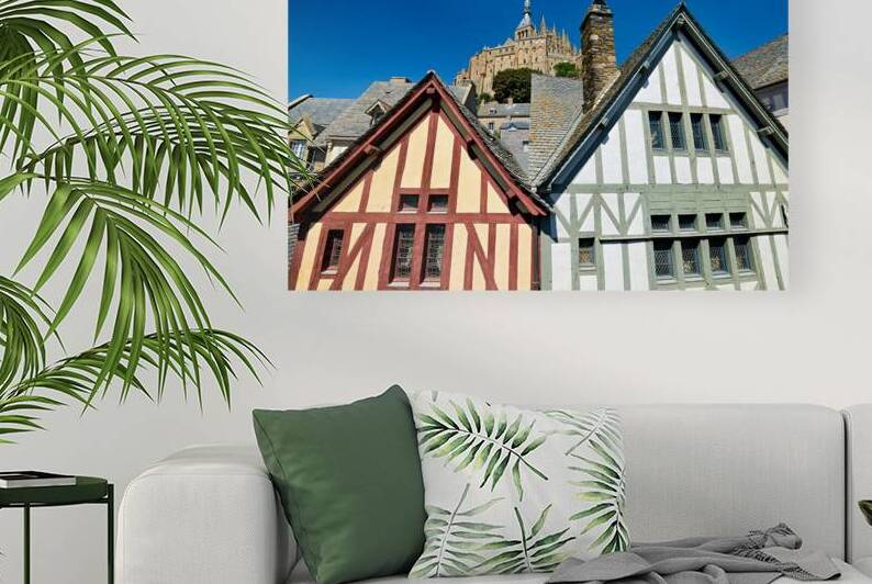 Visit Mont Saint Michel in Normandy France under clear blue sky by Marco Brivio