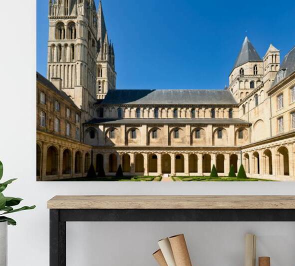 Historic Abbey of Saint Etienne in Caen Normandy under clear sky by Marco Brivio