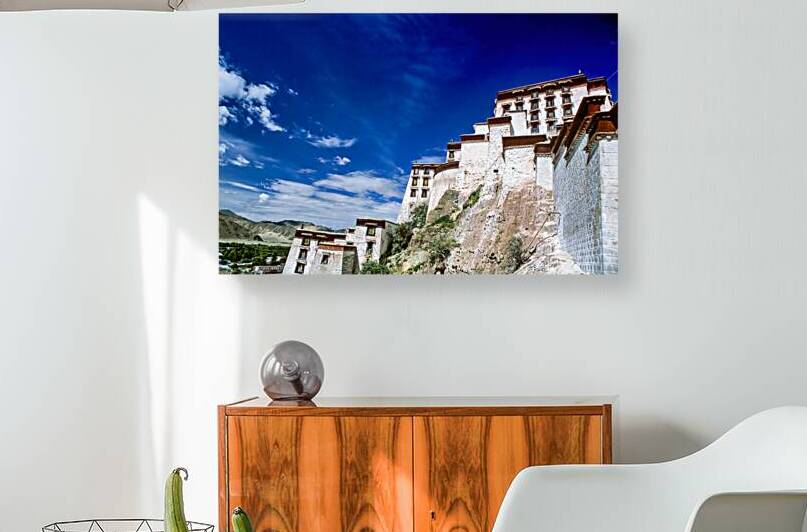 Majestic Potala Palace stands in Tibet under a bright blue sky by Marco Brivio