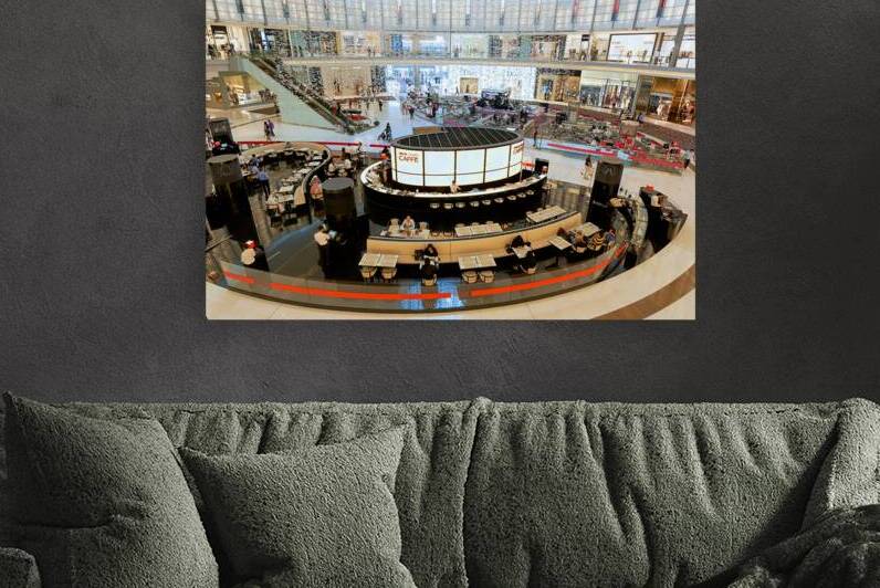 Luxury mall in Dubai features multiple levels and busy shoppers by Marco Brivio