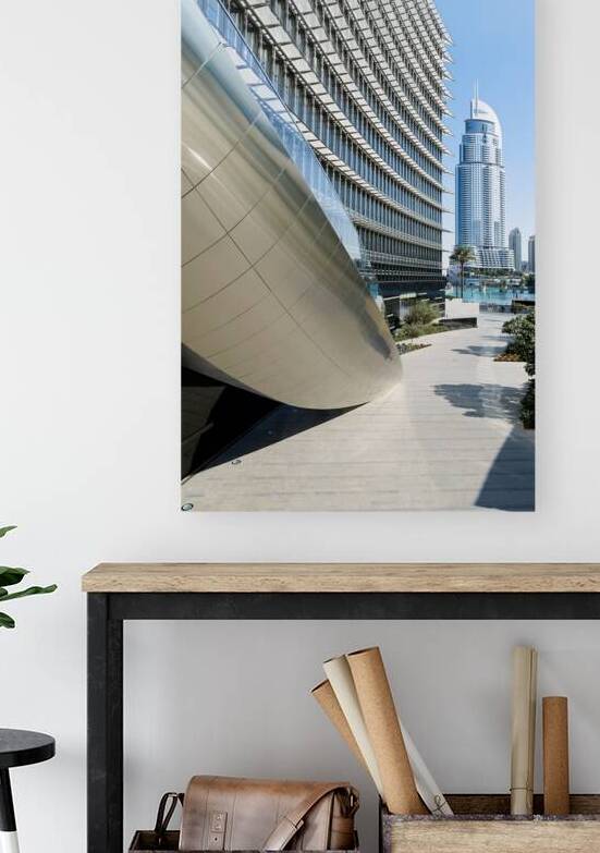 Modern architecture in Dubai with curved building and skyscraper by Marco Brivio