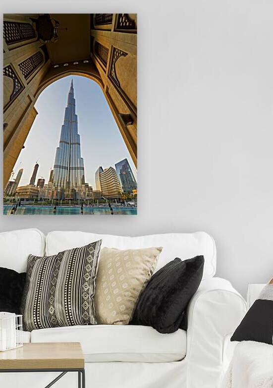 Burj Khalifa seen through ornate arch in Dubai cityscape by Marco Brivio
