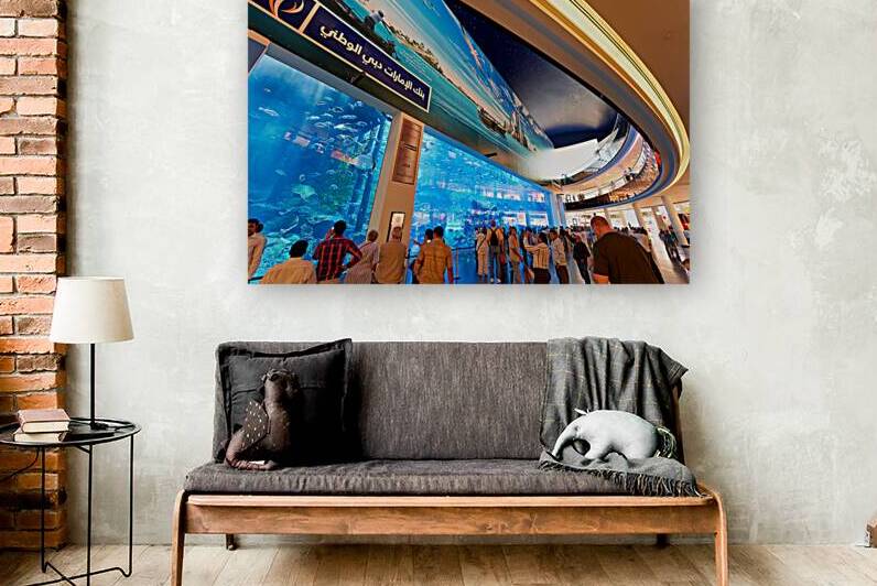 Visitors enjoy giant aquarium and screen in Dubai mall by Marco Brivio