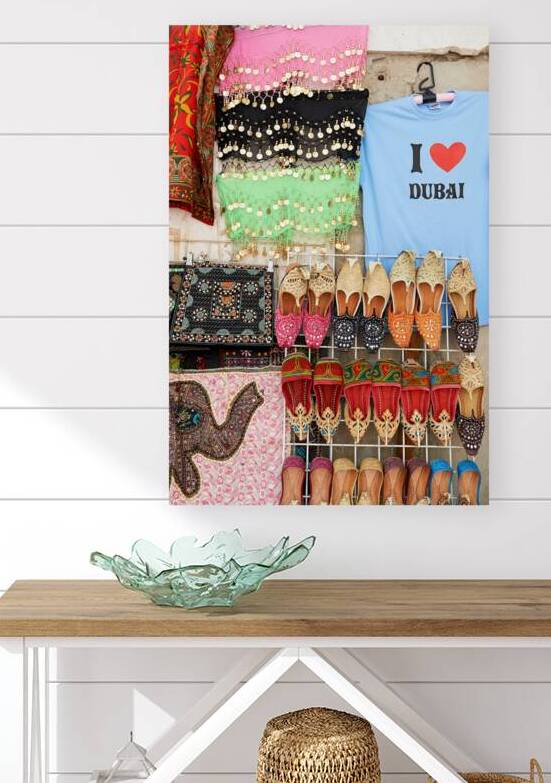 Traditional market in Dubai with shoes and scarves for sale by Marco Brivio