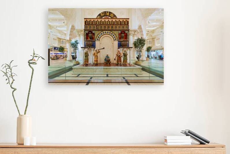 Ornate Middle Eastern decor with music and clock in Dubai by Marco Brivio