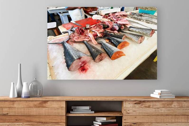 Fresh fish and seafood displayed on ice in Dubai market by Marco Brivio