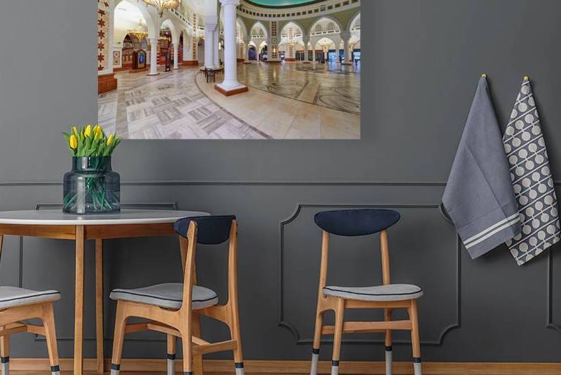 Ornate Middle Eastern interior with arches and chandeliers in Du by Marco Brivio