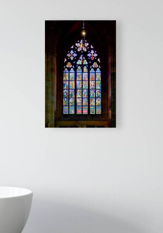 Vibrant stained glass window in a gothic cathedral. by Marco Brivio