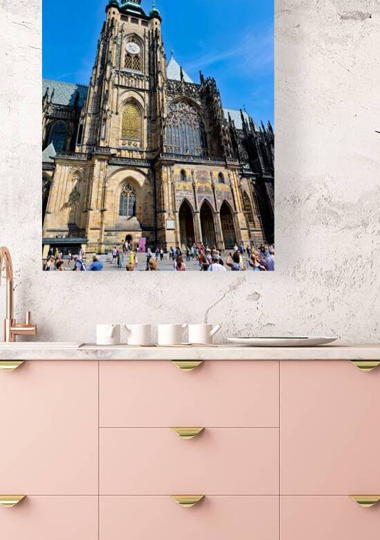 Majestic St. Vitus Cathedral with tourists under a blue sky. by Marco Brivio