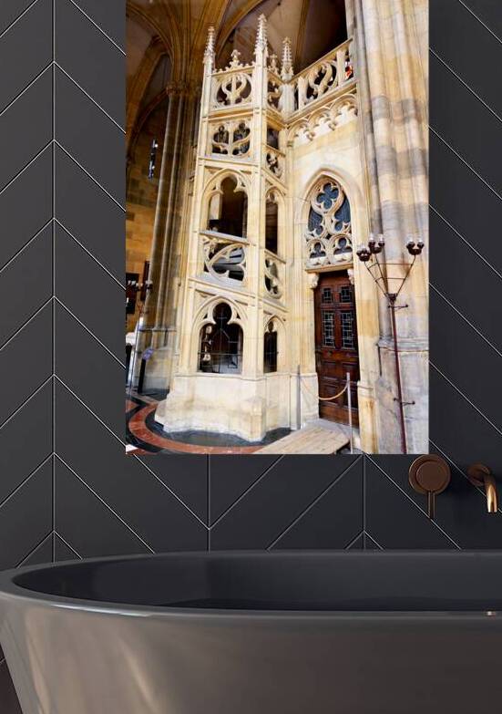 Ornate Gothic stone structure and door inside a cathedral. by Marco Brivio