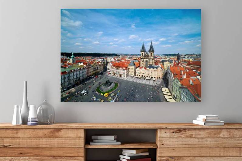 Aerial view of bustling Prague Old Town Square and Týn Church. by Marco Brivio