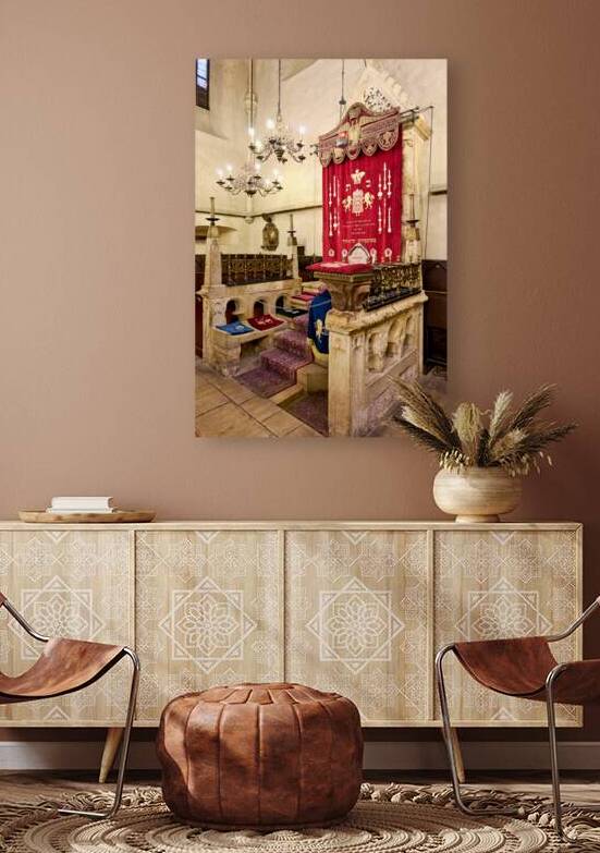 Historic synagogue interior with ornate Ark and bimah. by Marco Brivio