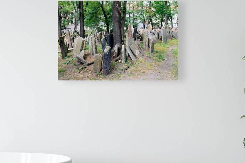 Old Jewish Cemetery Prague: ancient gravestones among trees. by Marco Brivio
