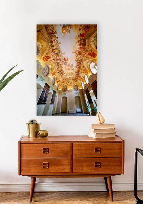 Grand hall with elaborate Baroque ceiling frescoes and wall art. by Marco Brivio