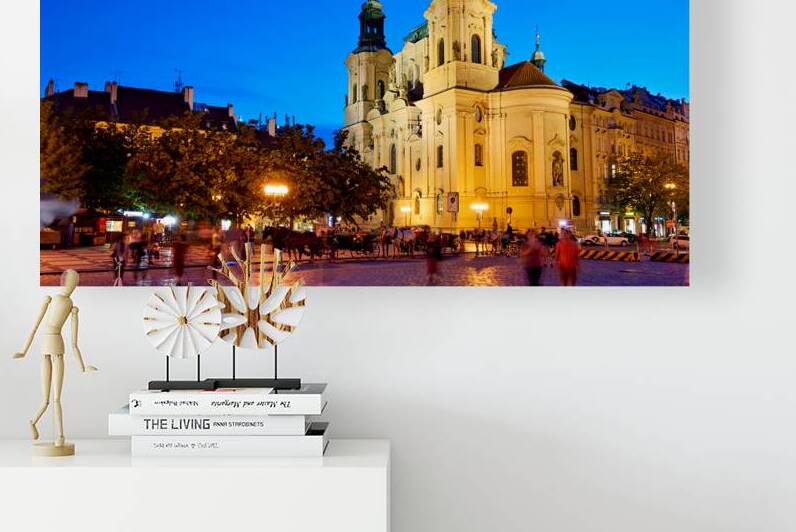 Illuminated church and lively square at night. by Marco Brivio