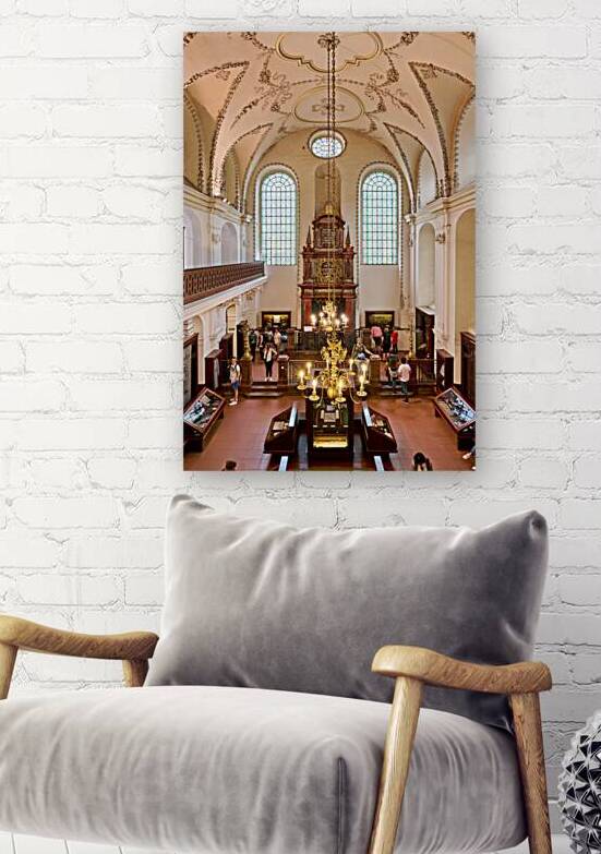Ornate synagogue interior with tourists chandelier and stained by Marco Brivio