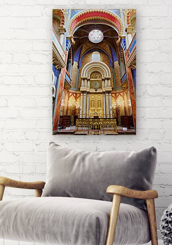 Ornate synagogue interior with golden ark and colorful decoratio by Marco Brivio
