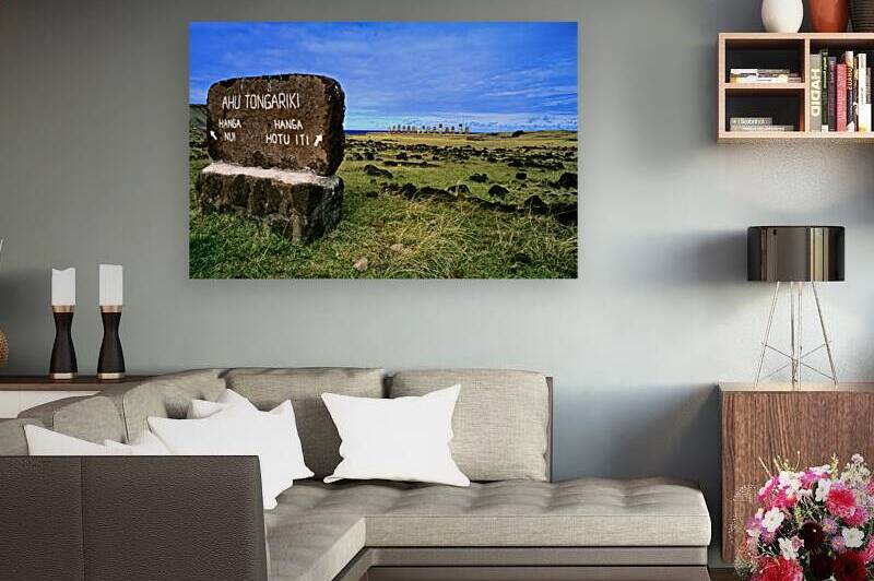 Easter Islands Ahu Tongariki Moai statues and directional sign. by Marco Brivio