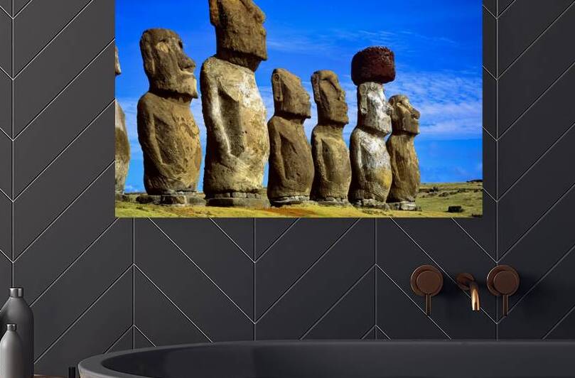 Row of Moai statues on Easter Island. by Marco Brivio