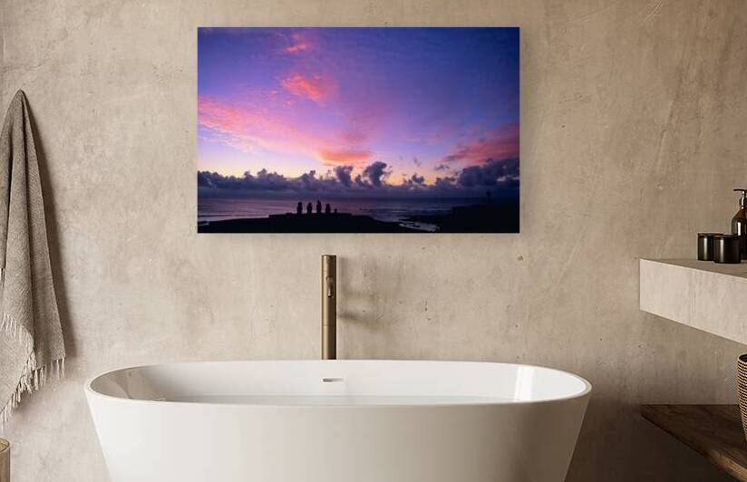 Moai silhouettes against a stunning purple and pink sunset. by Marco Brivio