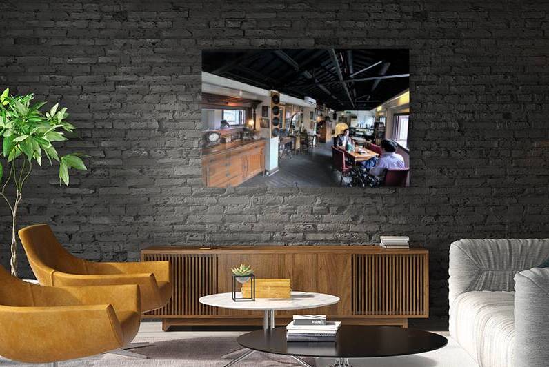 Customers enjoy drinks and food in a vintage cafe in Shanghai by Marco Brivio