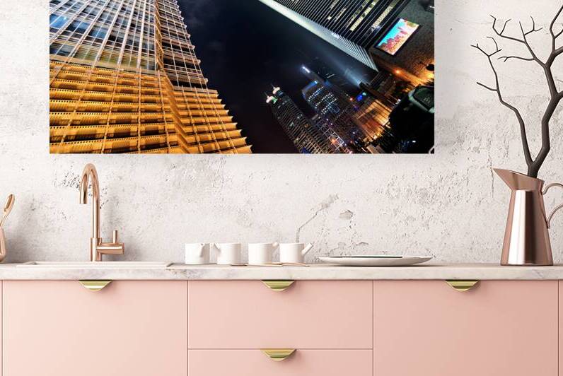 City skyline with skyscrapers shining bright in Shanghai at nigh by Marco Brivio