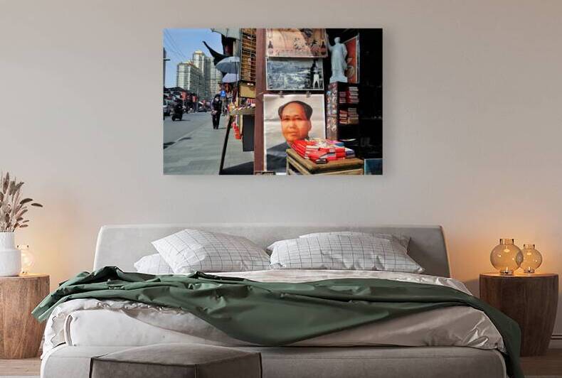 Street stall in Shanghai sells Mao posters and red books by Marco Brivio