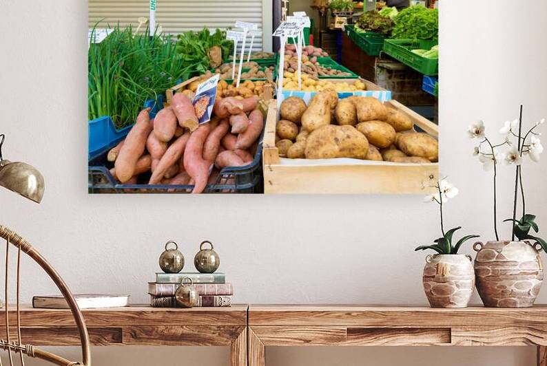 Greengrocer selling varieties of potatoes in Augsburg Bavaria by Marco Brivio