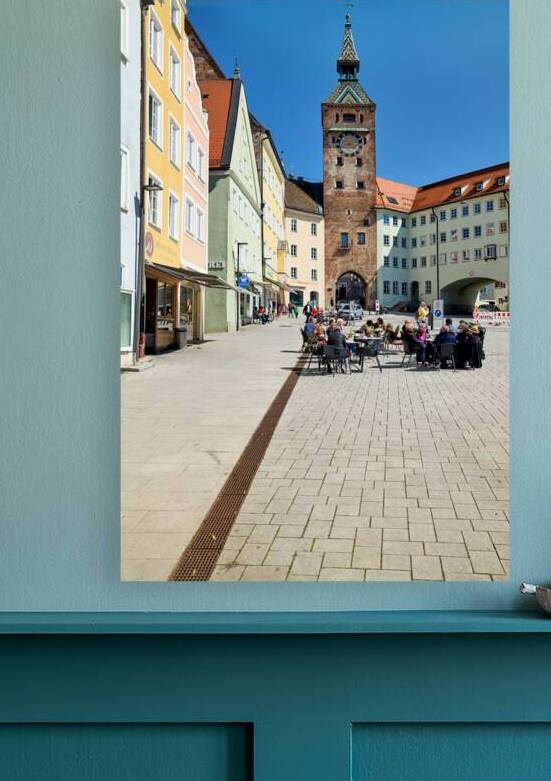 People enjoy meals in Hauptplatz square in Landsberg am Lech Ge by Marco Brivio