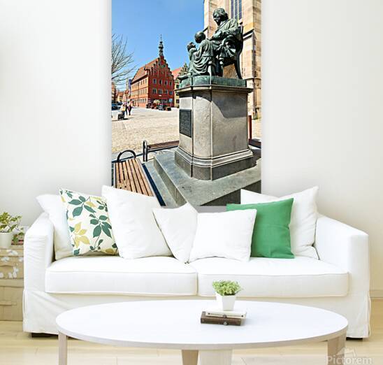 Visitors explore Dinkelsbuhl old town and historical statue by Marco Brivio