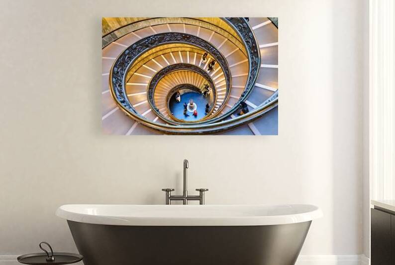 Visitors walk down Bramante staircase in Vatican Museums in Rome by Marco Brivio