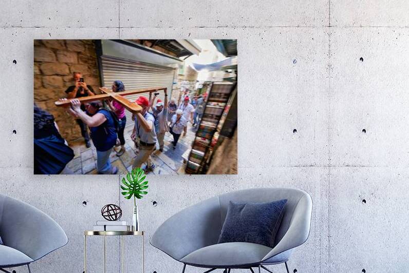 Pilgrims walk along the Way of Sorrows in Jerusalem Israel by Marco Brivio