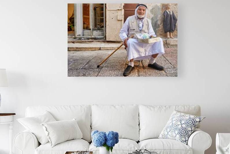 Old man sits in the old city of Jerusalem asking for help by Marco Brivio