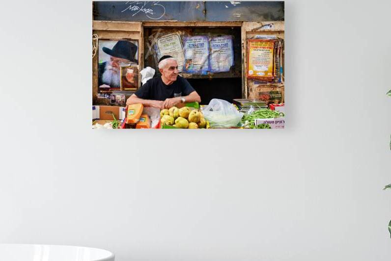 Man selling fruits in Mahane Yehuda Market in Jerusalem Israel by Marco Brivio