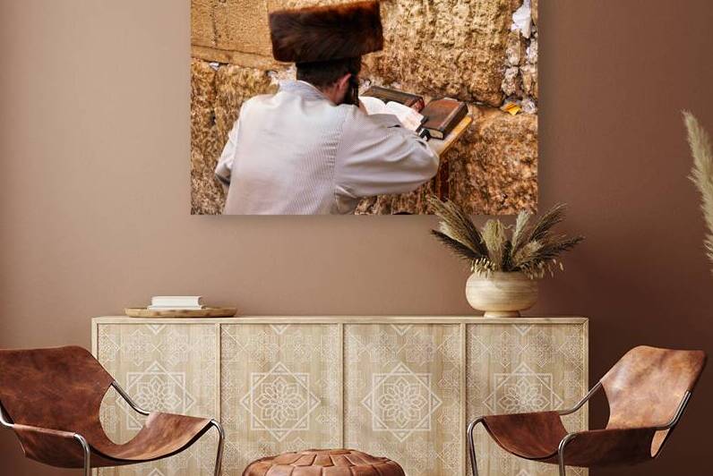 Orthodox Jews pray at the Wailing Wall in Jerusalem by Marco Brivio