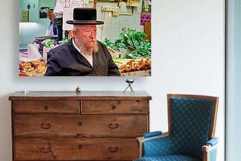 Elderly man in Mahane Yehuda Market in Jerusalem during a busy d by Marco Brivio