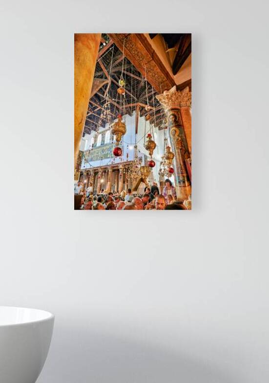 Visitors gather inside the church of the nativity in Bethlehem by Marco Brivio