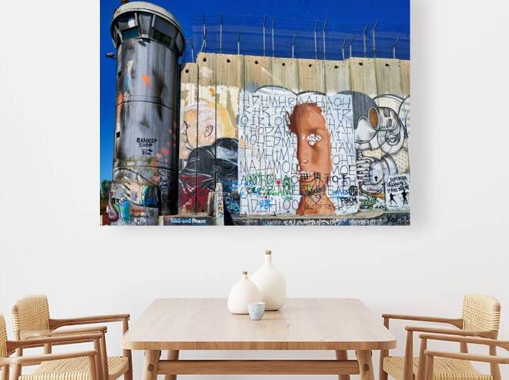 Wall and artwork near a guard tower in Bethlehem Jerusalem by Marco Brivio