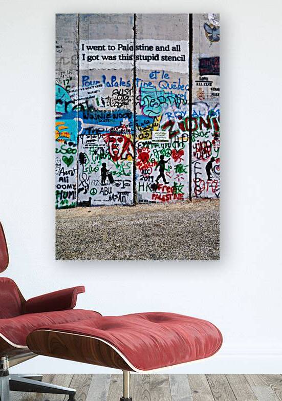 Wall art shows messages on the separation wall in Bethlehem by Marco Brivio