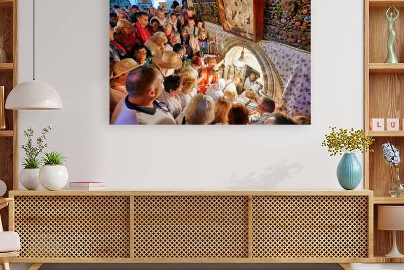 Crowd gathers at grotto of nativity in Bethlehem Israel by Marco Brivio