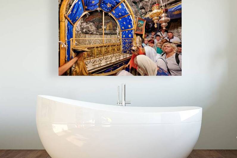 Visiting grotto of nativity in Bethlehem Jerusalem during the d by Marco Brivio