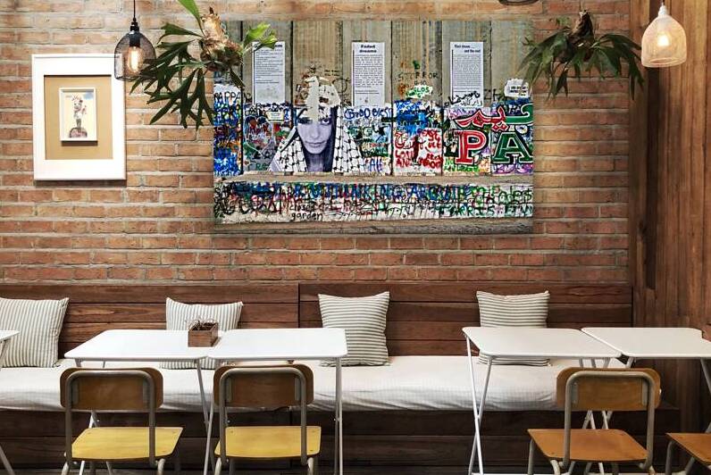 View of the separation wall in Bethlehem with graffiti and art by Marco Brivio