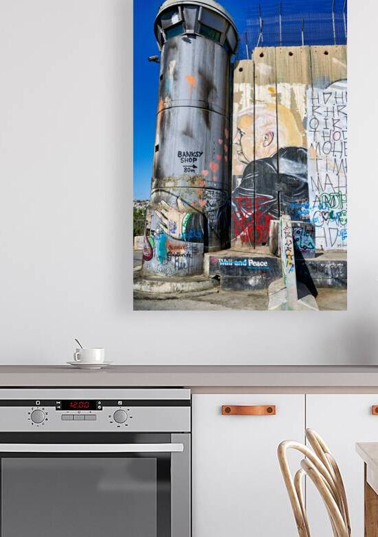 West Bank separation wall in Bethlehem shows street art and towe by Marco Brivio