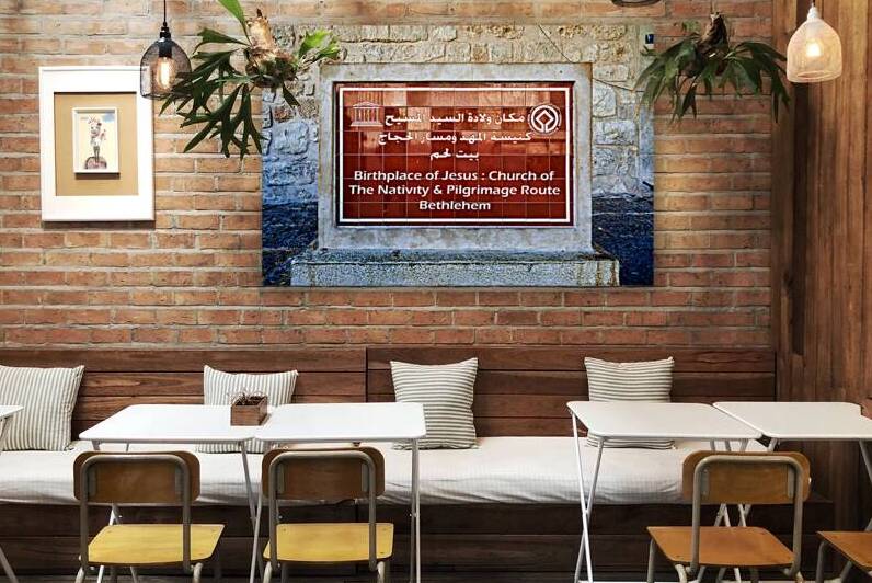 A sign marks the Church of the Nativity in Bethlehem Israel by Marco Brivio