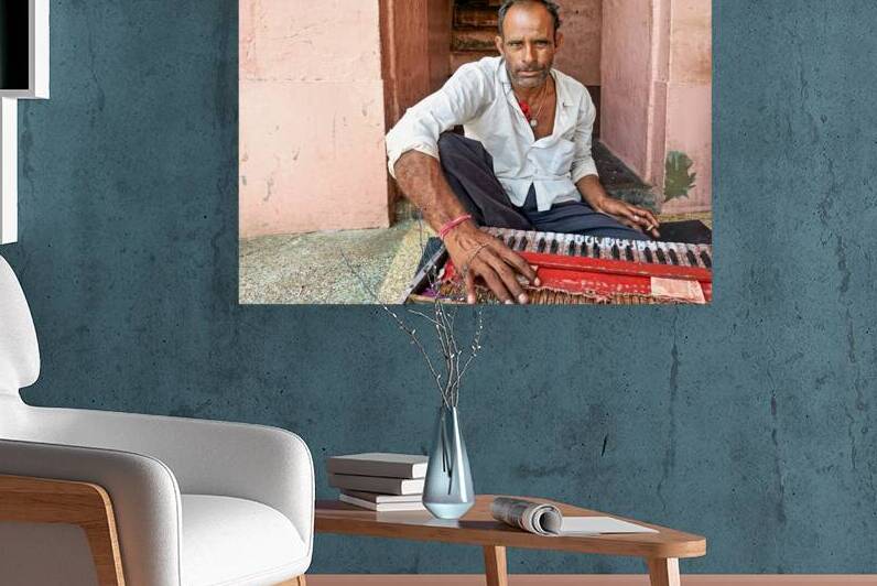 Musician performing in the streets of Deshnok Rajasthan India by Marco Brivio