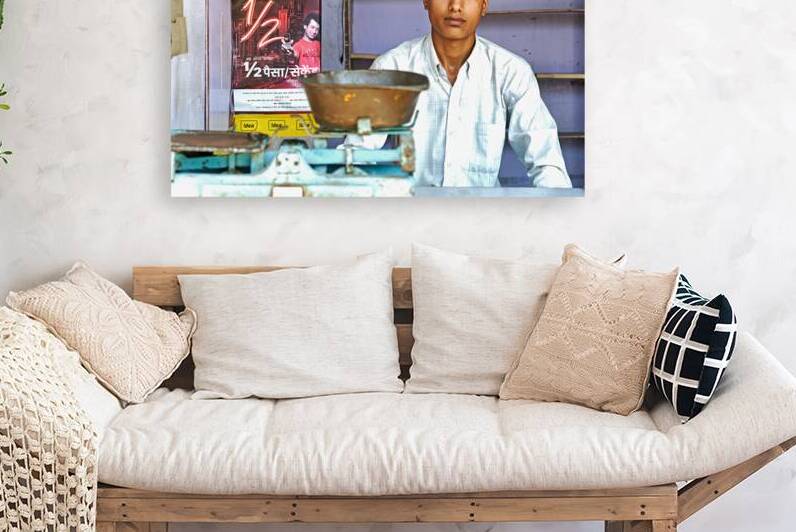 Portrait of a boy in Khimsar Rajasthan in a shop setting by Marco Brivio