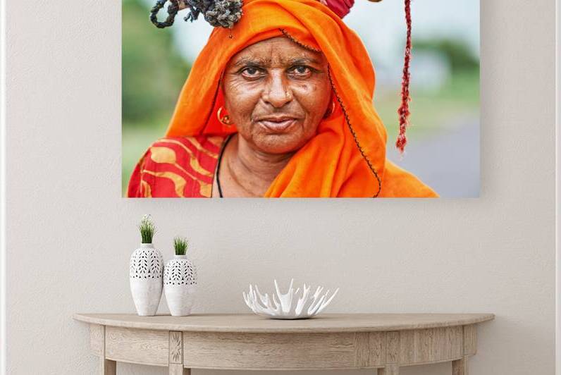 Portrait of an old woman in Rajasthan India wearing bright clot by Marco Brivio