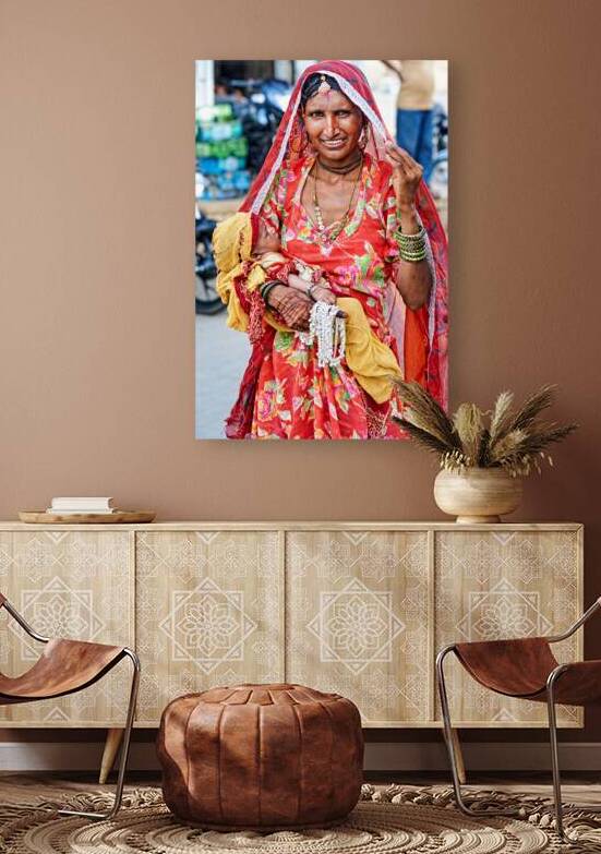 Woman with baby in Jaisalmer Rajasthan marketplace by Marco Brivio